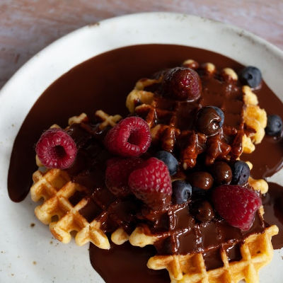 Breakfast Waffles drenched in Raw Chocolate Sauce